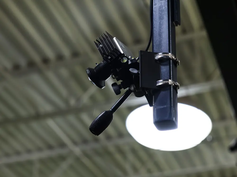 A motion-capture camera mounted above the pitching area at the Virginia Maven Lab